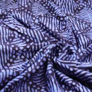 blue African adire batik hand printed shapes in colours fabric sold by the Yard