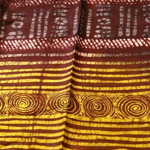 hand-decorated adire batik fabric sold by the yard, cotton handprinted batik fabric