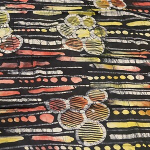 Black and Yellow floral themed hand printed African adire batik fabric sold by the yard