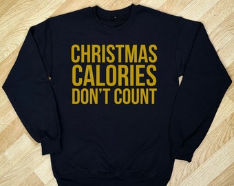 Le calorie di Natale non contano i vestiti di Natale, stampati in oro su un maglione di Natale Maglione di Natale, un regalo festivo per Natale