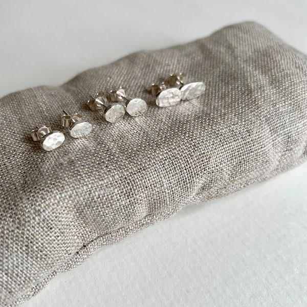 Pebble hammered finish Stud earrings in recycled silver.