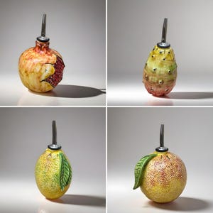 Hand-decorated fruit-shaped oil cruet in Caltagirone ceramic