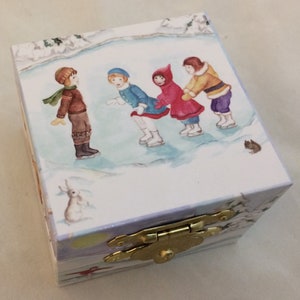 Miniature Ice Skaters Music Boxes, Christmas Music Box, Tiny Boxes with clockwork musical movement inside.