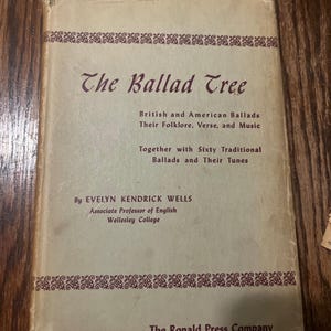 May include: A vintage book titled "The Ballad Tree" with a light beige cover and maroon text. The book's cover features decorative borders and the text "British and American Ballads, Their Folklore, Verse, and Music". Published by The Ronald Press Company, New York.