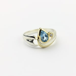 Beautiful ring made of blue topaz and white topaz set in 925 silver gemstone ring blue faceted gold plated and silver birthday size 23/63