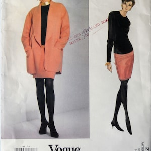 May include: Vogue Patterns American Designer sewing pattern featuring two Donna Karan designs. One design is a peach-colored coat and skirt ensemble. The other is a black long-sleeved top and peach-colored skirt. The pattern number is 2796.