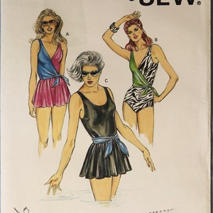 May include: A set of three ceramic mugs with a speckled, matte finish. The mugs are in shades of cream, light gray, and dark gray. Each mug has a simple, minimalist design, perfect for coffee or tea.