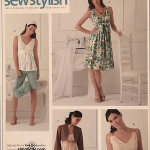 May include: A Simplicity 3867 sewing pattern envelope for sizes 14, 16, 18, 20, 22. The cover features illustrations of a floral print dress, a white sleeveless top with light green shorts, a brown bolero jacket, and a cream-colored dress with a bow.