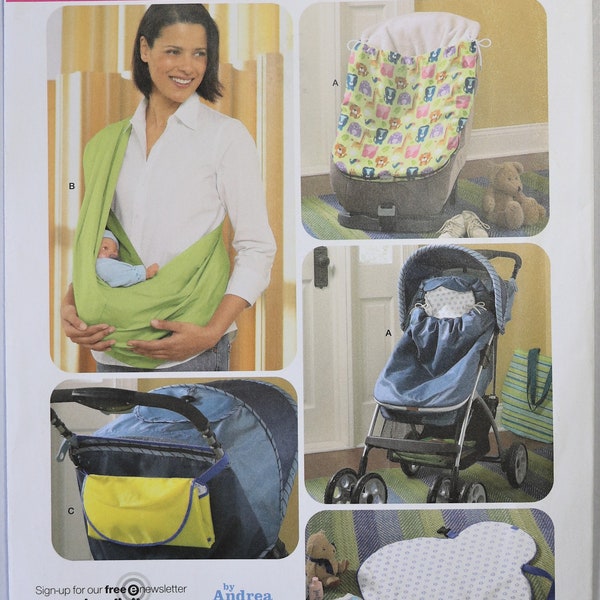 Simplicity 3712. Baby accessories pattern.  Infant sling carrier,  Stroller, bunting cover. changing pad pattern.  Uncut