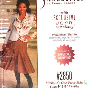 May include: A sewing pattern envelope for Silhouettes by Peggy Sagers #2850, Michelle's One-Piece Skirt, featuring sizes 4-18 and 14w-28w. The cover displays a person wearing a light blue floral blazer and a brown flared skirt, with text details.