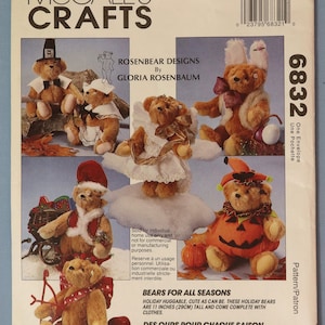 May include: McCall's Crafts 6832 sewing pattern envelope featuring Rosenbear Designs by Gloria Rosenbaum. The cover displays six brown teddy bears dressed in various seasonal costumes, including holiday, angel, and pumpkin outfits. Text includes Bears for All Seasons and states the bears are 11 inches tall.