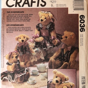 May include: A McCall's Crafts sewing pattern envelope for The Rosenbears, featuring illustrations of four jointed teddy bears in floral outfits. The package includes text indicating the bears are 18 inches and 11 inches tall, with a tea set scene.