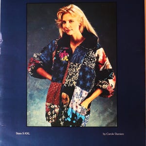 May include: A white ceramic mug with a black handle and the text "But First, Coffee" in a black, bold font. The mug is on a white surface.