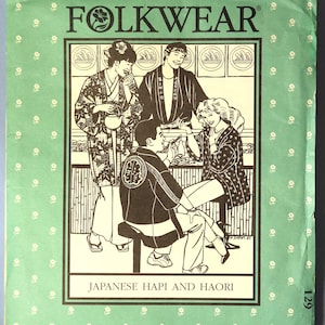 May include: A green paper pattern cover with the word "FOLKWEAR" above an illustration of people wearing Japanese Hapi and Haori. The cover has a repeating pattern of small white flowers.