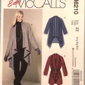 May include: Easy McCall's sewing pattern M6210 size ZZ for a long-sleeved cardigan with a draped front. The envelope displays a photograph of a grey cardigan and two illustrations showing a blue version and a red version with a belt.