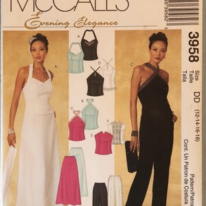 May include: McCall's Evening Elegance sewing pattern 3958, size DD (12-14-16-18). The envelope features illustrations of various halter-style tops, a long skirt, and trousers in white, black, and pink, showcasing multiple garment design options.