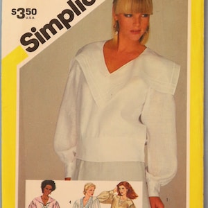 May include: Vintage Simplicity sewing pattern, size 10 Miss, featuring a white blouse with a V-neck and wide collar. The pattern includes illustrations of different blouse styles. The price is $3.50 U.S.A.