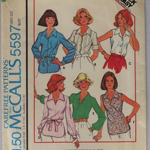 McCall's 5597.  Women's blouse pattern.  Plus size blouse or tunic with sleeve variations pattern.  SZ 20 Uncut