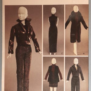May include: Vogue Doll Collection sewing pattern 7758 featuring five outfits for dolls. The envelope displays illustrations of dolls wearing a leather-look jacket and textured pants, a long turtleneck dress, a long coat, a vest with a skirt, and a jumpsuit.