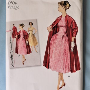 Simplicity 8731.  Women's dress and swing coat pattern.  Retro 1950's dress and swing coat pattern.  SZ 14-22  Uncut