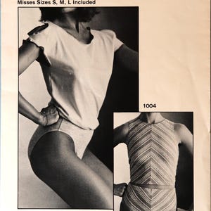 May include: A sewing pattern envelope titled prime moves designer bodywear featuring two garment styles. One is a short-sleeved top with high-cut bottoms, and the other is a sleeveless, chevron-striped bodysuit. Includes Misses Sizes S, M, L.
