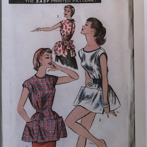 May include: Vintage sewing pattern titled "Advance 7878 Medium." The cover features illustrations of three different dresses. The text includes "The Easy Printed Pattern!" and "Sew-Easy!" The price is listed as 25¢ in the US and 30¢ in Canada.