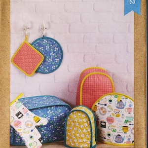 Kwik Sew 4292.  Appliance covers, hot pads and oven  mitts pattern.  Kitchen appliance covers, pot holders and mitts pattern.  Uncut