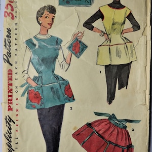 May include: Vintage Simplicity pattern 4492 featuring illustrations of aprons. The aprons are in various styles, including a teal apron with red floral accents and a yellow apron with black sleeves. The pattern includes the text "Simple to Make."