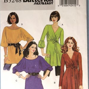 May include: A sewing pattern from Butterick, B5248, featuring four different tunic and dress designs. The pattern includes sizes X-Small to Medium. The image shows illustrations of the garments in various colors, including yellow, green, purple, and red.