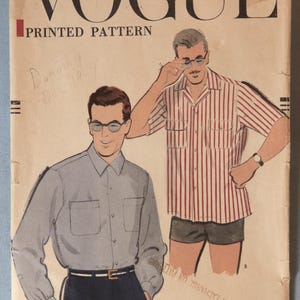 May include: A vintage Vogue printed pattern envelope, number 9366, featuring illustrations of two shirts. One is a long-sleeved solid shirt, and the other is a short-sleeved red and white striped shirt. The envelope includes text such as Vogue, Printed Pattern, and Large.