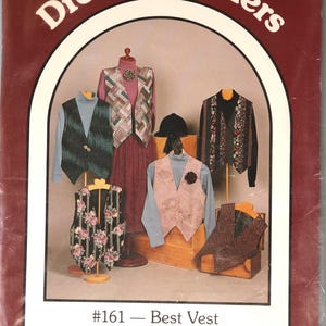 May include: A sewing pattern envelope titled Dream Spinners #161 Best Vest, featuring illustrations of five different vests in various fabrics, patterns, and colors, including floral and geometric designs, with sizes 6-20 listed.