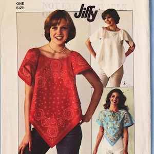 May include: Simplicity pattern envelope featuring three women modeling different Jiffy tops. The envelope is blue and white with the number 7877 and the word "Simplicity" in large letters. The tops are red, white, and blue.