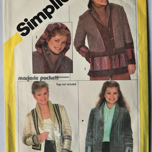 May include: Simplicity pattern 5287 featuring a woman modeling various jacket designs. The pattern includes a hooded jacket, a jacket with patchwork details, and two other jacket styles. The text "marjorie puckett" is visible.