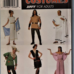 May include: Simplicity Costumes pattern featuring six adult costume designs. The costumes include a Roman toga, a gladiator outfit, a flapper dress, a scarecrow, and an Egyptian-style dress. The pattern is labeled "Jiffy for Adults."