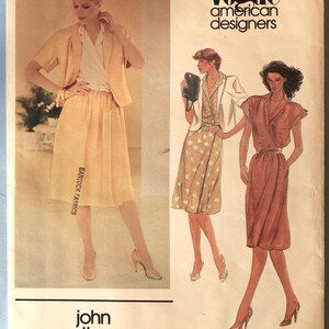 May include: Vintage Vogue American Designers sewing pattern featuring illustrations of women's clothing designs. The cover includes the text "Vogue American Designers" and "John Anthony". The pattern number is 2714.