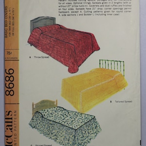 May include: A McCall's 8686 printed pattern envelope for basic bed covers for twin beds 39 inches by 75 inches or full beds 54 inches by 75 inches. The envelope displays illustrations of a red throw spread, a yellow tailored spread, and a blue shirred spread.