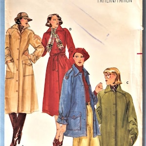 May include: A Butterick 5078 sewing pattern envelope featuring illustrations of four different coat styles. The designs include a tan trench coat, a red belted coat with a plaid scarf, a blue jacket with a red turtleneck, and a green coat.
