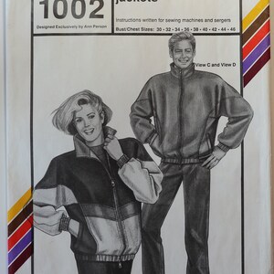 May include: A sewing pattern envelope for Stretch & Sew 1002 color-blocked jackets. The cover features illustrations of two individuals wearing zip-up jackets with ribbed cuffs and waistbands. Text includes pattern number 1002, bust/chest sizes 30-46, and instructions for sewing machines and sergers. Copyright 1991.