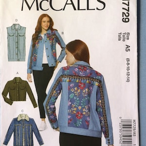 May include: McCall's sewing pattern M7729 features a denim jacket with floral embroidery and fringe details. The pattern includes views of a denim vest and other jacket styles. Size A5 (6-8-10-12-14).