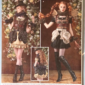 May include: Simplicity sewing pattern 8075 features steampunk-inspired costume designs. The cover shows two models in elaborate outfits with ruffled skirts, corsets, and accessories. The pattern includes sizes 14-22.