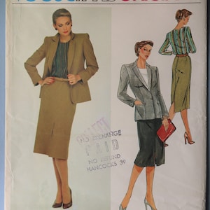 May include: Vogue Paris Original sewing pattern featuring Christian Dior designs. The cover shows illustrations of women's suits and a skirt suit. The suits are in shades of tan, gray, and green. The text includes "Christian Dior" and the pattern number 2405.