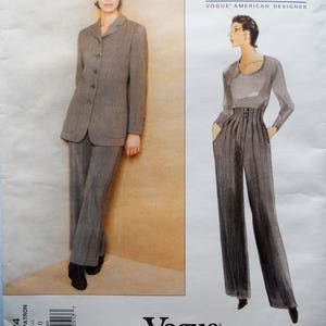 May include: Vogue Patterns sewing pattern featuring Anne Klein designs. The pattern includes a tailored suit with a blazer and pants, and a high-waisted pantsuit. The pattern is for sizes 6-8-10.