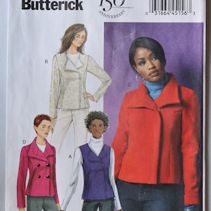 May include: Butterick sewing pattern B5958 for jackets and vests in sizes 14-22. The envelope features illustrations of four variations: a beige jacket, a red jacket, a magenta double-breasted jacket, and a purple sleeveless vest over a white top.