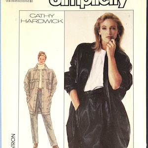 May include: Simplicity sewing pattern featuring designs by Cathy Hardwick. The pattern includes illustrations of a woman in a black leather jacket, shorts, and a white top, and another in a tan jacket and pants. The pattern number is 8382.