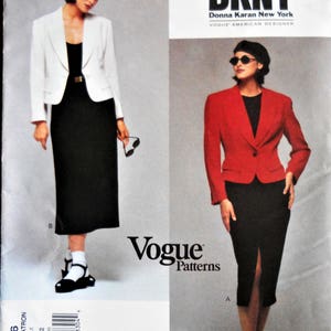 May include: A Vogue Patterns sewing pattern featuring two DKNY designs. The pattern includes a black dress paired with a white blazer and a red blazer. The DKNY logo is displayed at the top, with the pattern number 1306 visible.