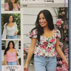 May include: A sewing pattern titled "knowME" by Alissah Threads, featuring a woman wearing three different tops. The pattern size is Y5 (18-20-22-24-26). The tops include a white eyelet top, a pink and white floral top, and a pink gingham top.