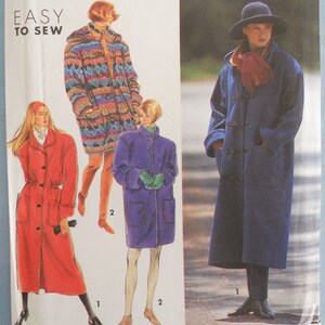 May include: A sewing pattern envelope labeled EASY TO SEW featuring illustrations and a photograph of four different coat styles. The designs include a long red coat, a patterned hooded coat, a purple coat, and a long blue duffle coat with toggles.