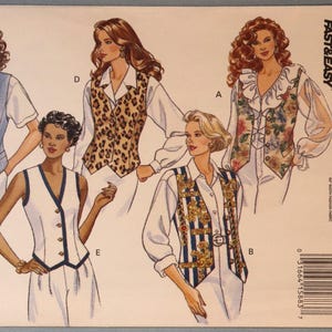 May include: A Butterick Classics 6714 sewing pattern envelope featuring illustrations of five different vest designs. The vests include a solid blue style, a leopard print version, a floral print with ruffles, a white vest with dark trim, and a striped vest with gold accents.