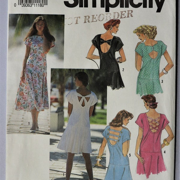 Simplicity 7221.  Misses dress pattern.  Maxi loose fit drop waist dress with circle skirt and keyhole back pattern.  SZ XS-XL. Uncut