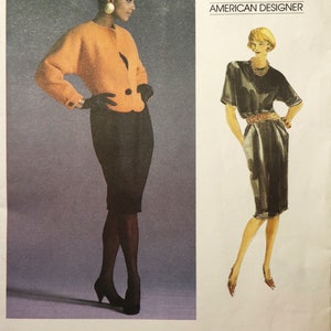 May include: Vogue Patterns sewing pattern featuring designs by Geoffrey Beene. The cover shows a woman in an orange jacket and black skirt, and a drawing of a black dress. The text reads "AMERICAN DESIGNER".